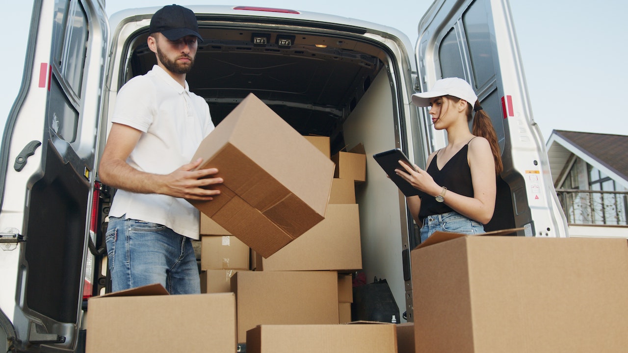 Van interior with moving boxes neatly stacked